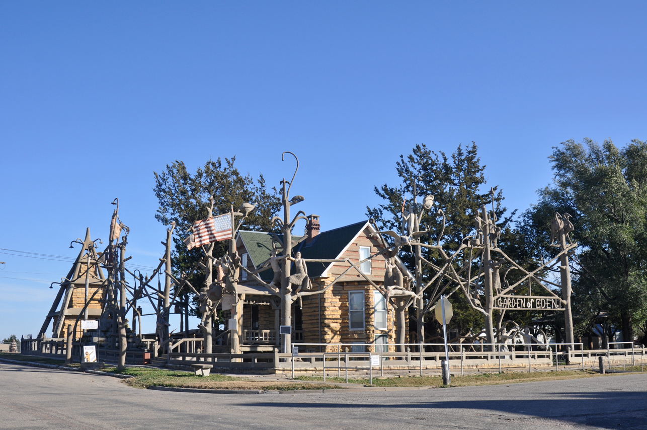 The Garden of Eden occupies an unassuming residential block in Lucas, KS, not far from the railway station, and is, as Dinsmoor puts it, “The most unique home, for living or dead, on earth.”
