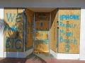 Most commerical establishments were boarded up, with some messages colorful
