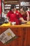 The counter girls reading my book on Texas BBQ